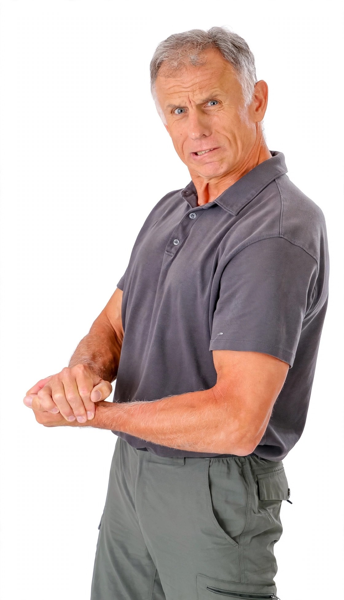 Brad Heineck posing in a gray polo shirt.